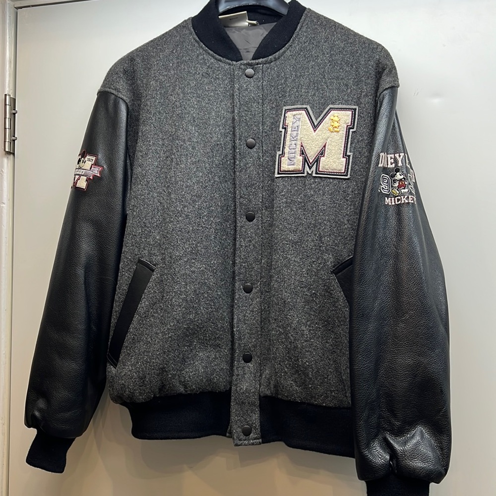 Disney Mens Letterman Jacket. Embroidered patches featuring Mickey, 1928, 1955.